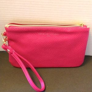 NWOT. Adrienne Vittadini pink wristlet.
